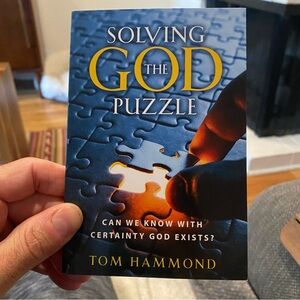 Solving the God Puzzle Paperback Book By Tom Hammond